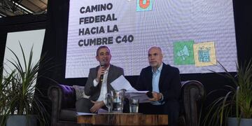 Los dirigentes secruzaron en agosto durante un encuentro sobre cambio climático.