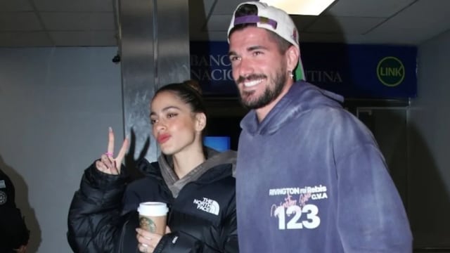 Tini y De Paul, en el arribo a Bs As. Foto: movilpress