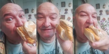 Larry de Clay comiendo sánguche de empanada.