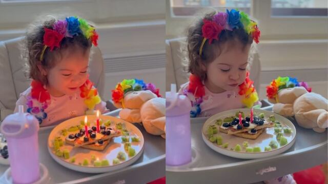 Nina Martínez soplando las velas de su segundo cumpleaños.