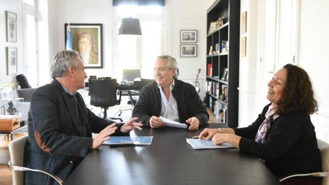 La reunión de transición entre Fernández, Camaño y Rossi.