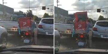 Un hombre llevaba a un niño dentro de la caja de delivery de repartidor