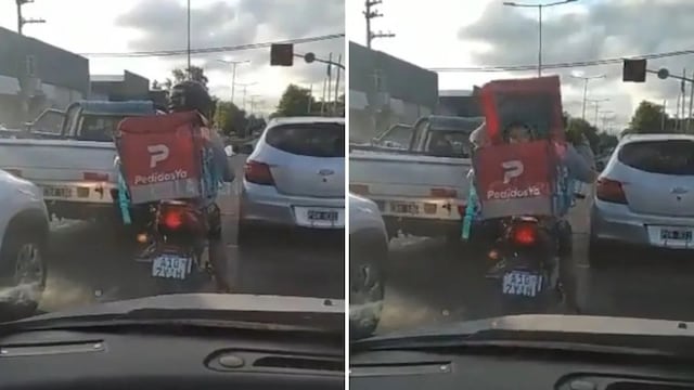 Un hombre llevaba a un niño dentro de la caja de delivery de repartidor