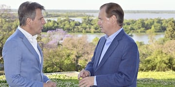 Martín Redrado junto a Gustavo Bordet